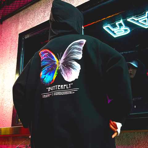 Pull papillon bleu dans le dos